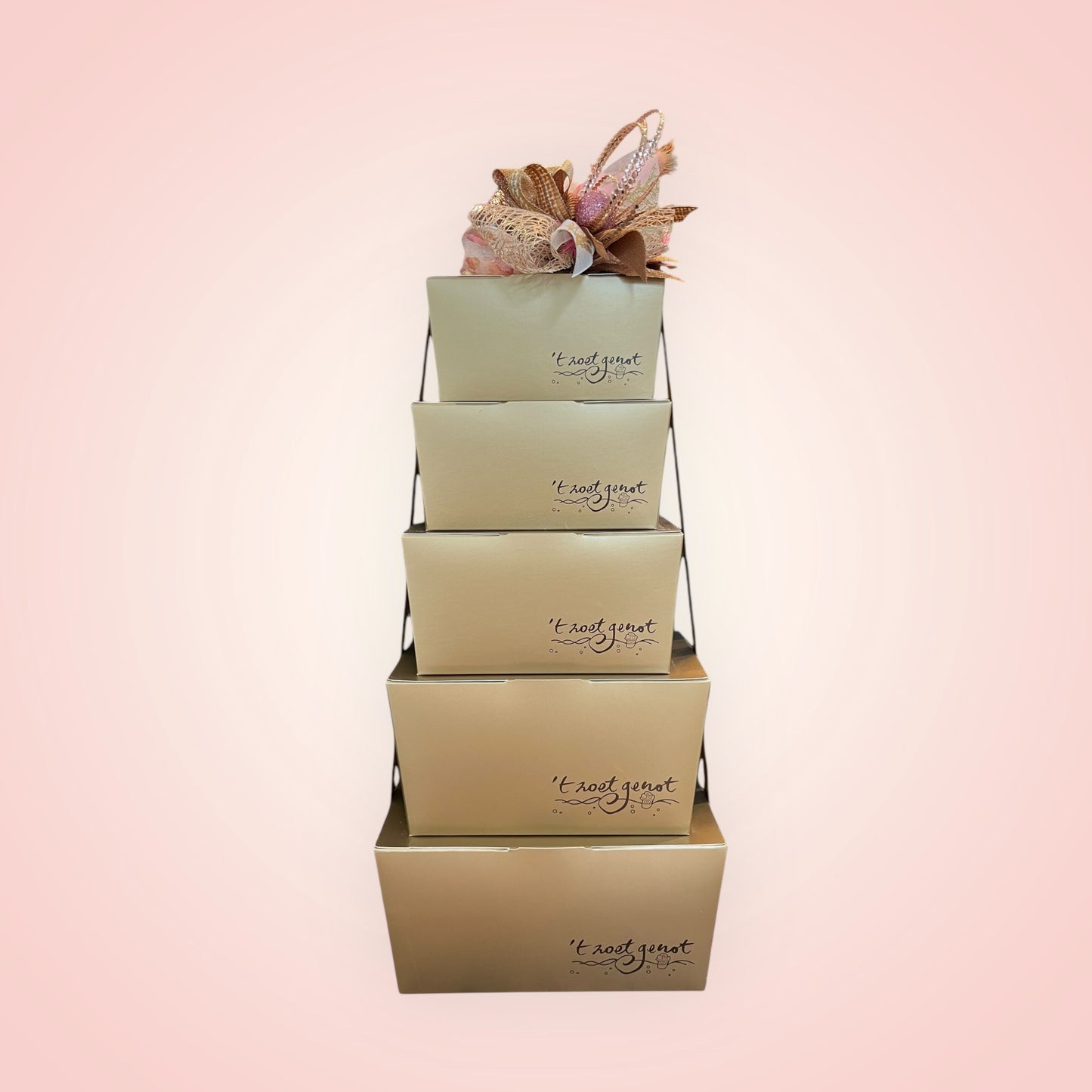 Artisanale pralines in gouden ballotin