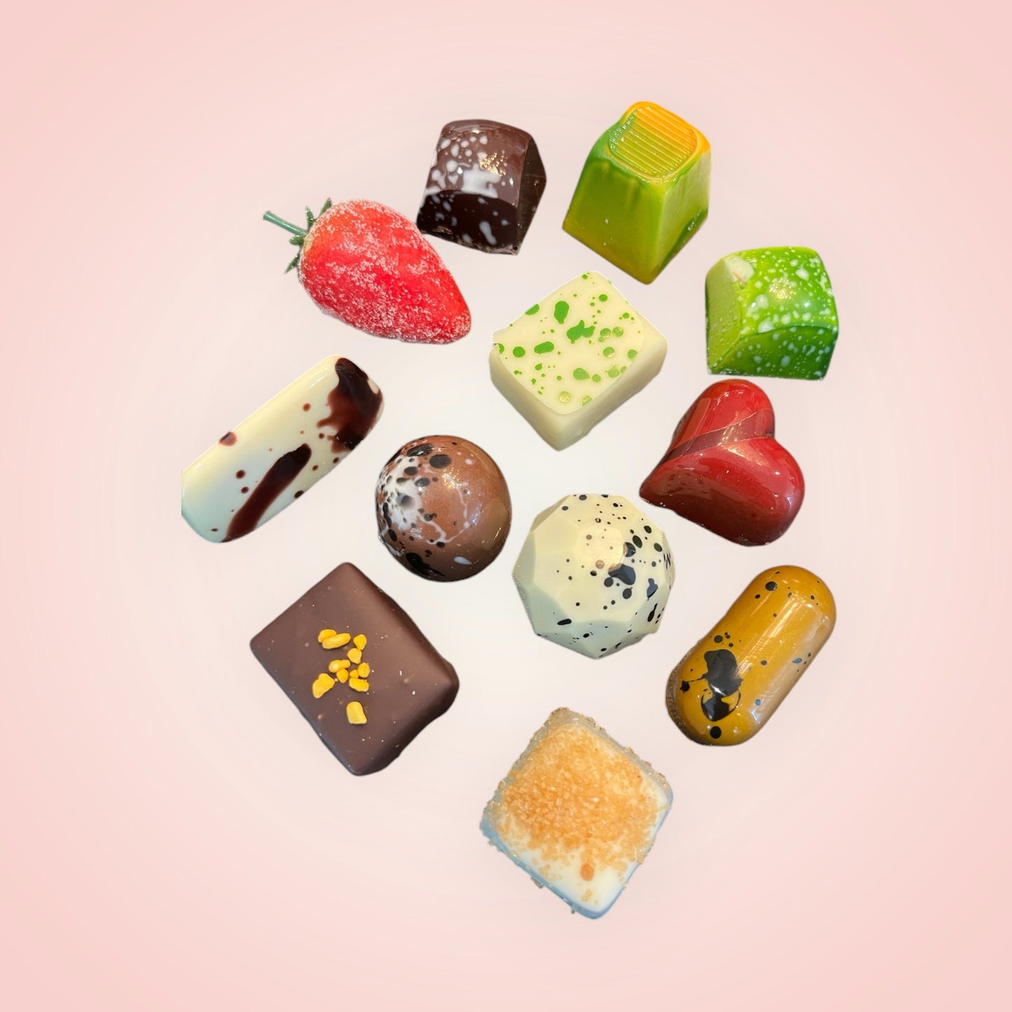 Artisanale pralines in gouden ballotin